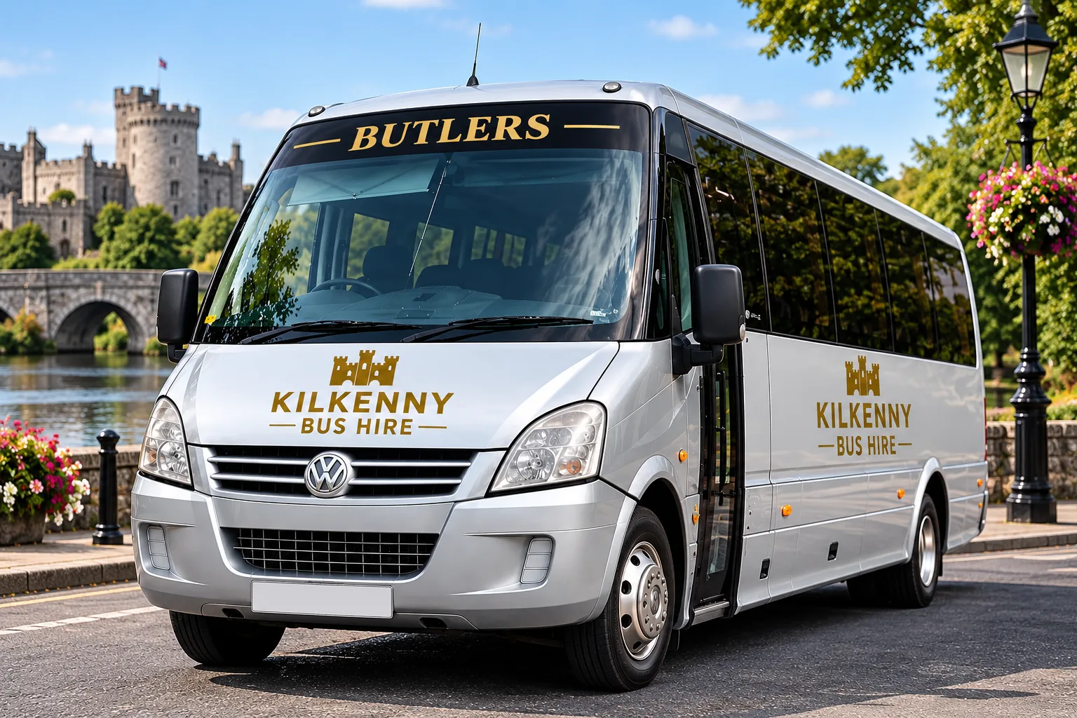 30-seater mini coach hire Kilkenny: Kilkenny Bus Hire coach beside Kilkenny Castle